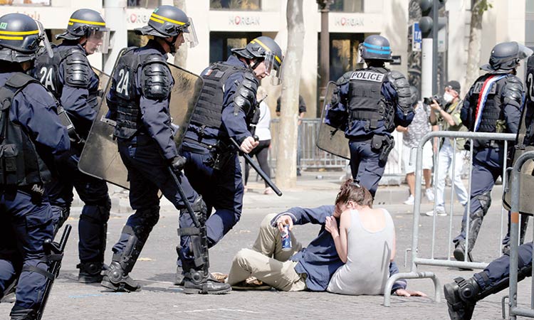 Violence erupts in France after Bastille Day parade