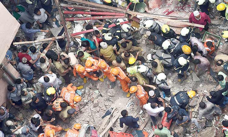 10 dead, many feared trapped in Mumbai building collapse