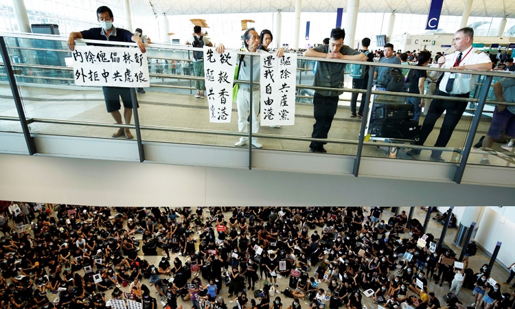 Trouble feared as Hong Kong activists return to scene of triad attack