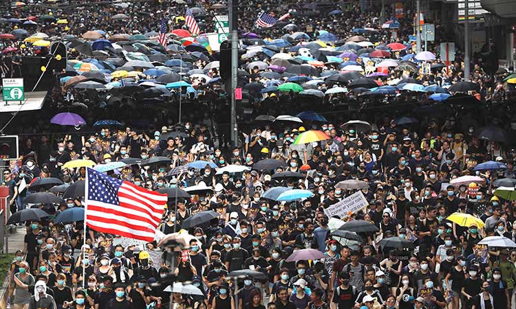 Protesters mass in Hong Kong amid fears of growing cycle of violence