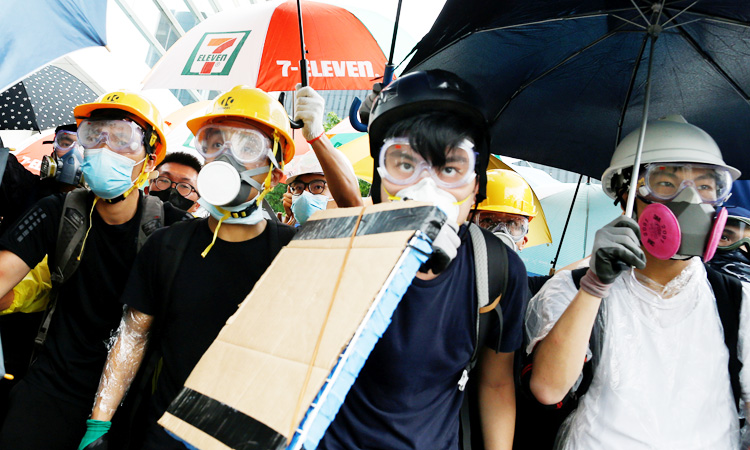 First charges against Hong Kong anti-government protester