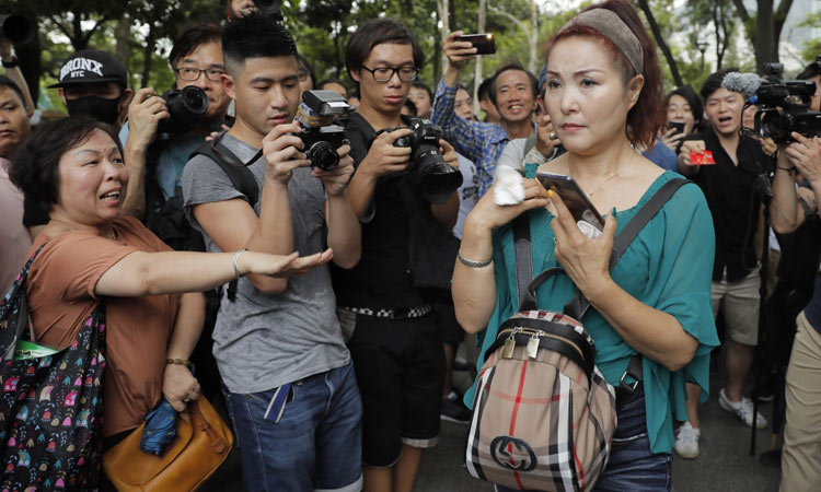 'Dancing aunties' spark anger as police, protesters clash in Hong Kong 