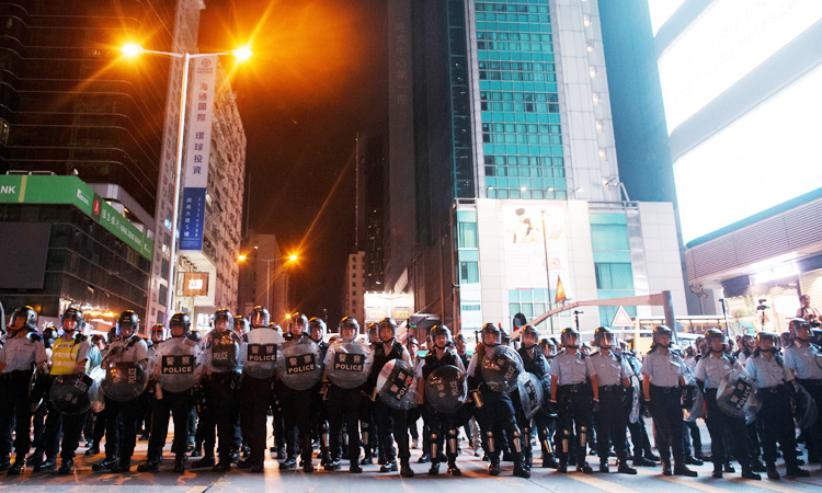 Hong Kong police arrest six at Kowloon protest