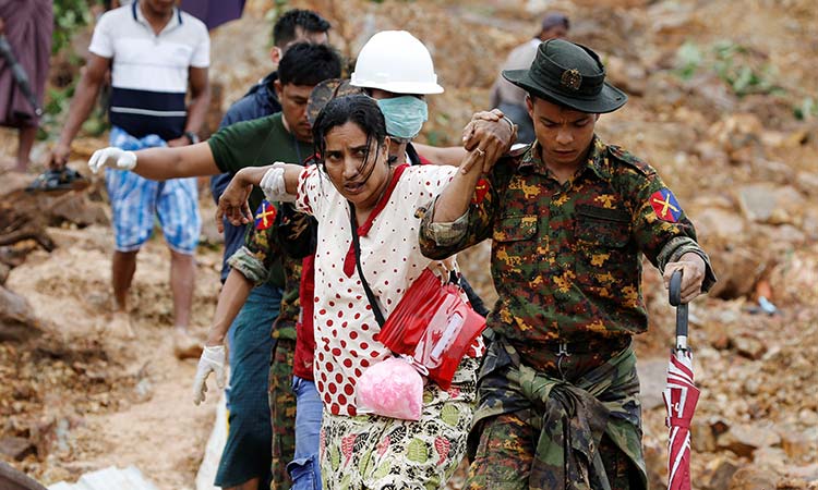 Myanmar troops help flood rescue after landslide kills 48