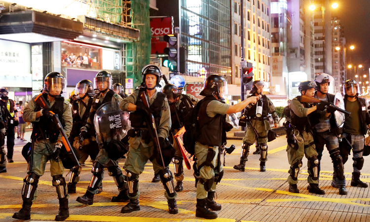 Hong Kong mops up after weekend of violence, braces for more protests