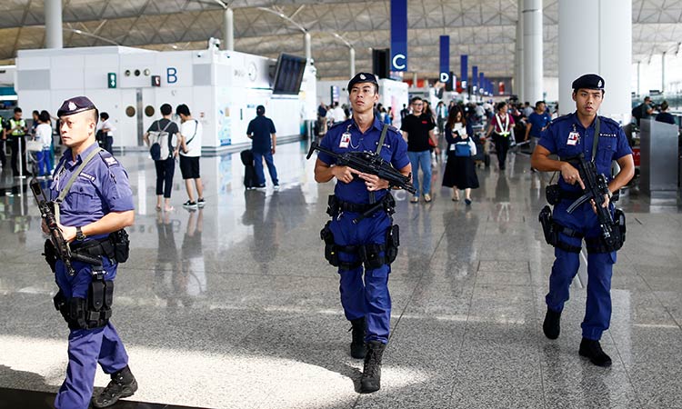 Hong Kong airport reopens after overnight clashes, mass protests