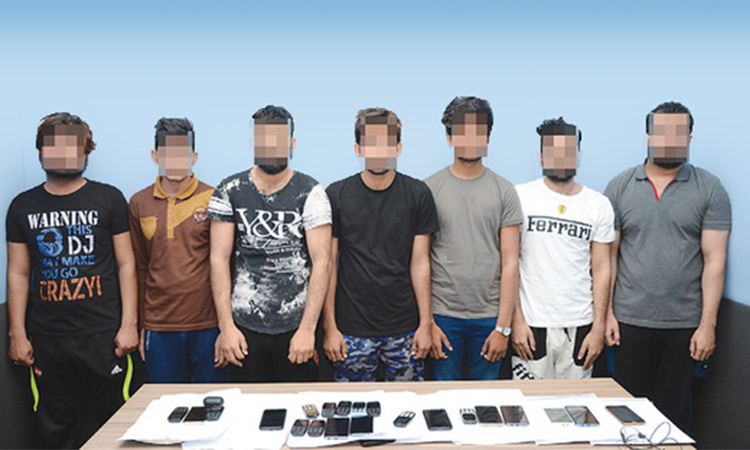 Police arrest gang of 25 Asians for phone scam crimes 