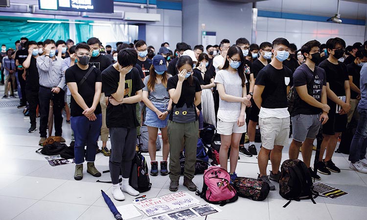 Hong Kong protesters mark ‘triad’ attack