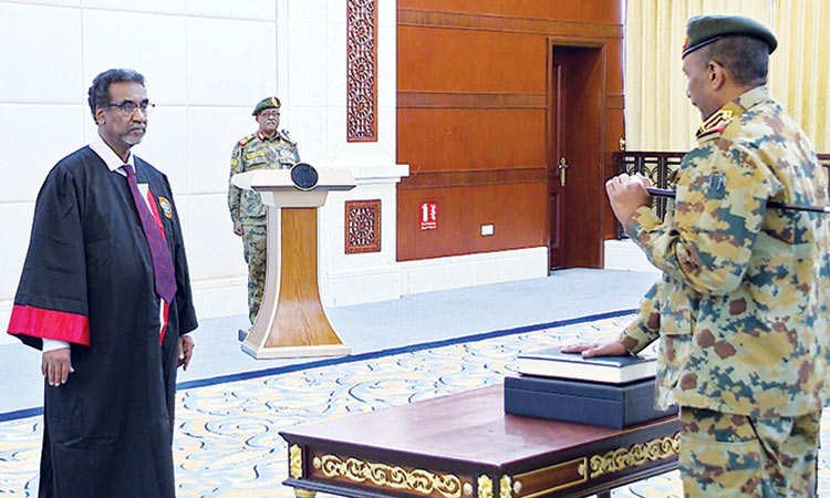 Sudan’s top general sworn in as leader of new ruling body