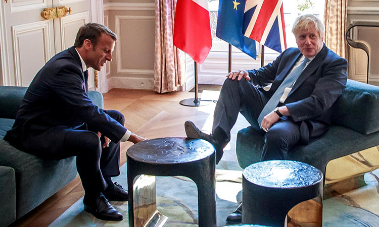 Boris feels at home in Elysee Palace, puts foot on table 