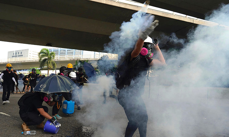 Tear gas fired as Hong Kong police, protesters clash