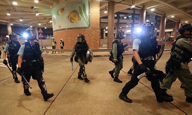 Hong Kong police arrest 29 as city returns to violence