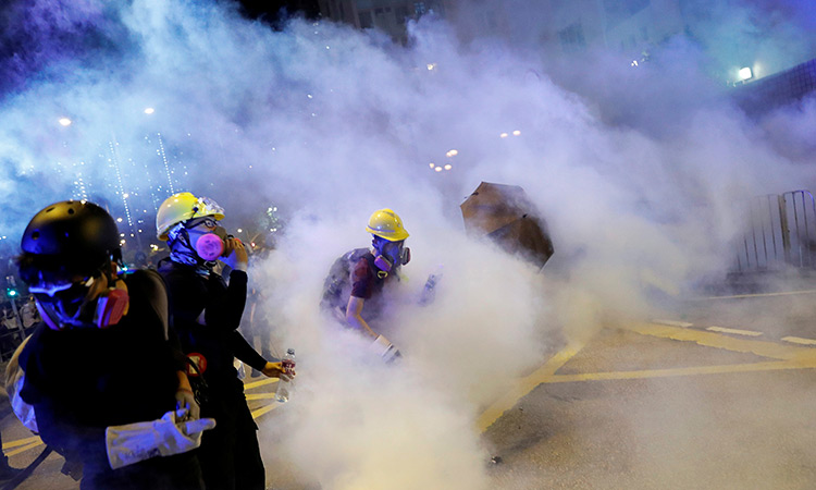 Twin rallies after tear gas clashes in Hong Kong tourist district