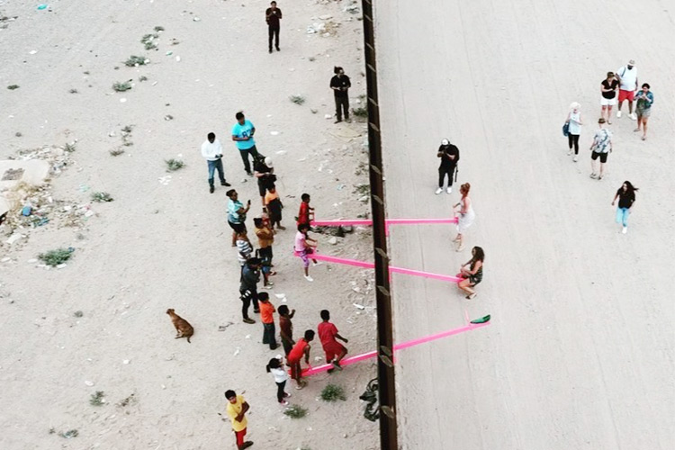 Video: Seesaws installed at US border wall so American and Mexican children can play together