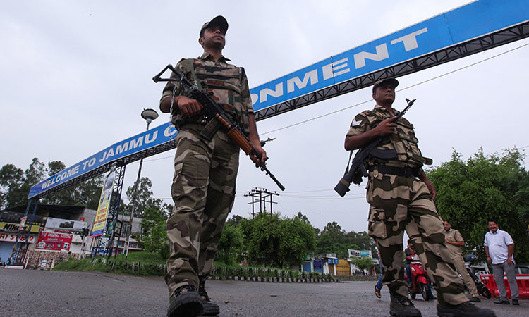 Armed soldiers patrol silent streets after Kashmir curfew