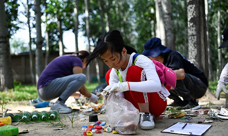 Activists get down and dirty clearing rubbish on mass cleanup day