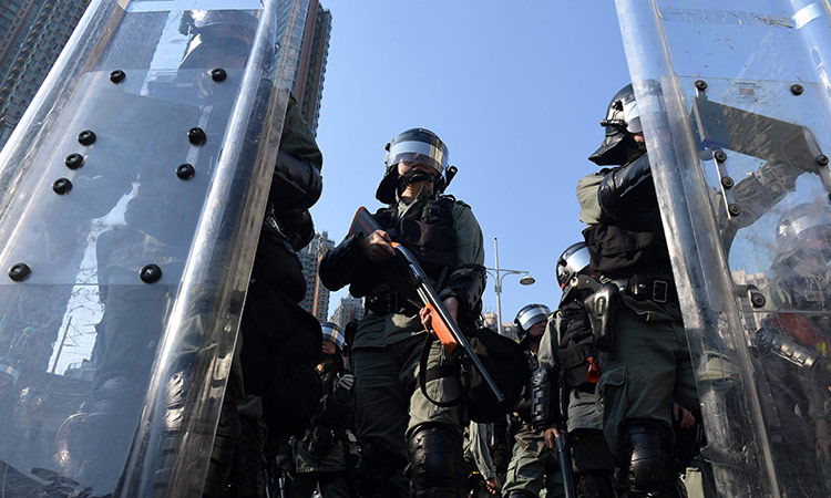 Hong Kong police raid pollster ahead of opposition vote