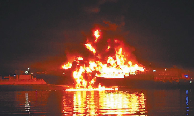 Fire engulfs sea vessel, guts 104 vehicles