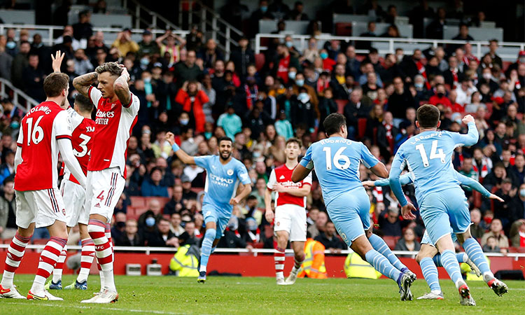 Manchester City late show at Arsenal opens up 11-point lead at the top