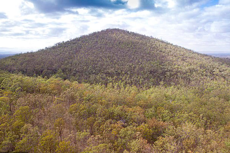 Now own a private mountain with breathtaking views, caves and bushland for $620,000