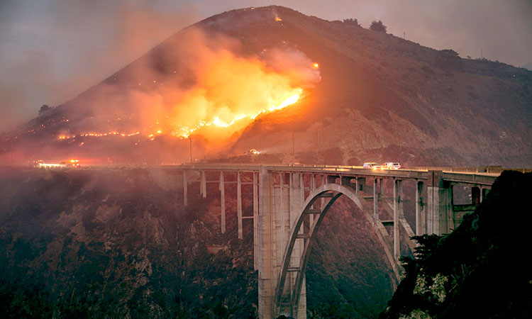 Firefighters gaining control of wildfire that closed scenic California highway