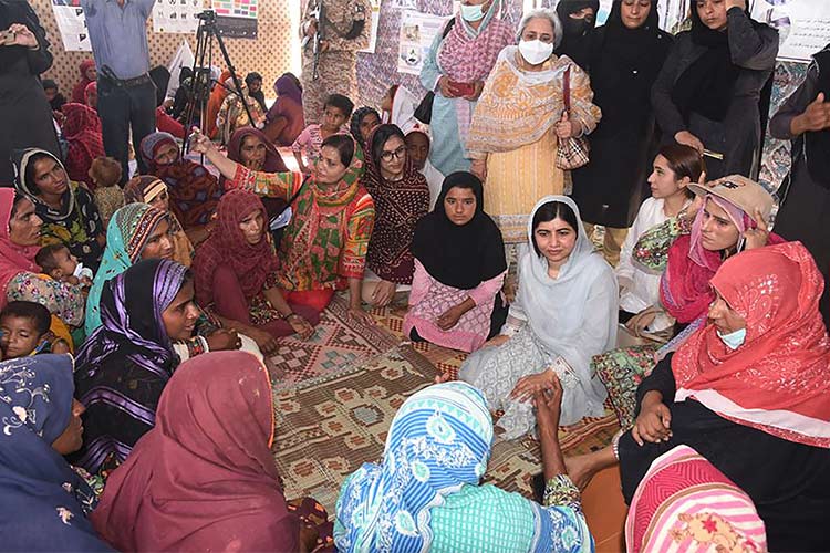 Malala visits women at flood camps in Pakistan