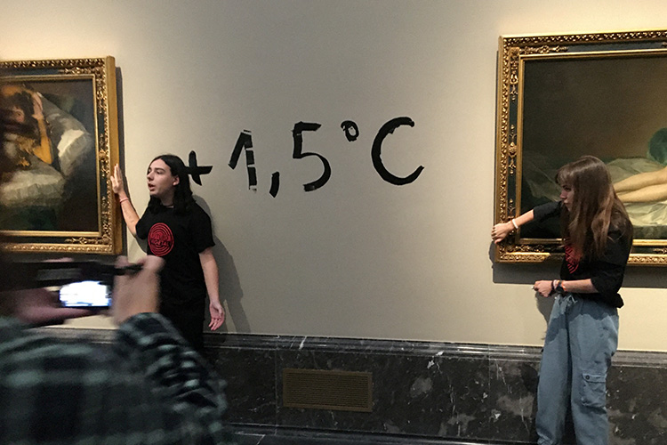 Climate activists glue hands to Goya frames at Prado museum in Madrid