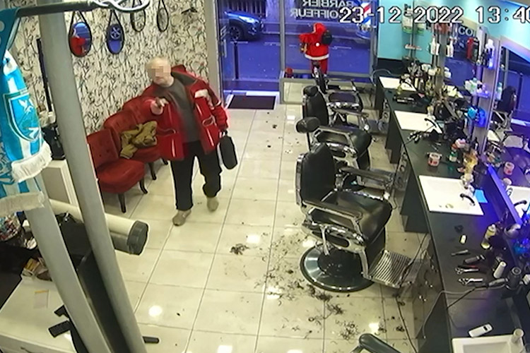 VIDEO: Surveillance footage shows armed Paris shooter entering a barbershop