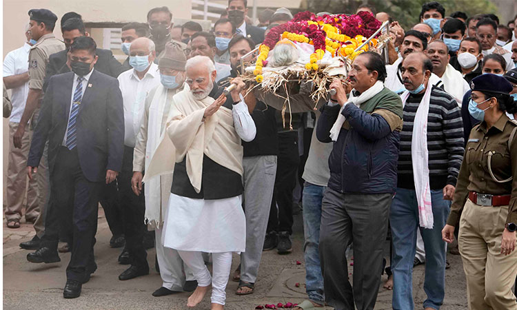 Indian PM Modi performs last rites of his mother Heeraben in Gandhinagar