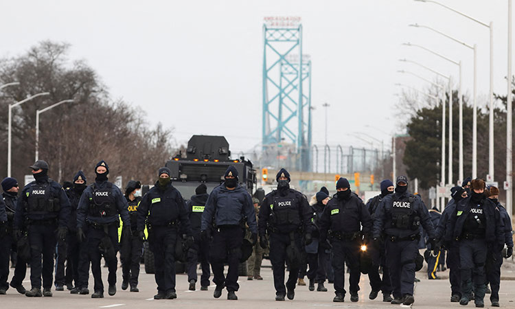 Blockaded US-Canada border reopens after police clear protesters