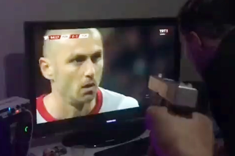 VIDEO: Turkey football fan shoots at TV after team loses to Portugal