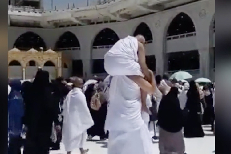 VIDEO: Man performs Umrah with his father on his shoulders