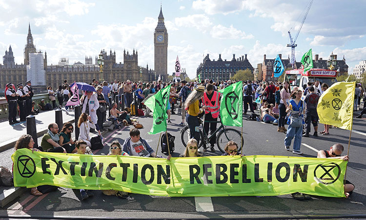 Climate activists block four of London's busiest bridges 