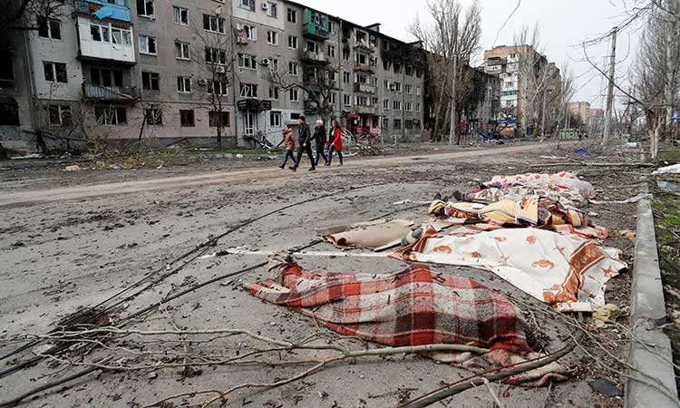 Missiles strike Lviv, bodies in streets of Mariupol