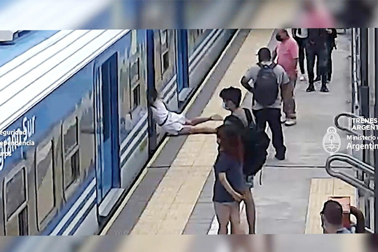 Woman falls under train and survives unharmed in Argentina