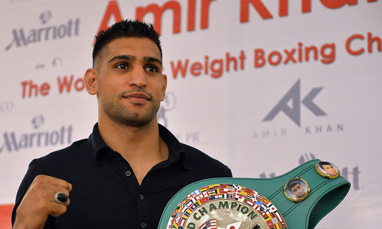 Former world champ Khan robbed at gunpoint