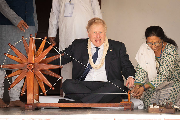 VIDEO: Boris Johnson has a go at spinning wheel at Sabarmati Ashram in India