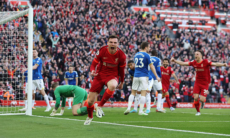 Liverpool maul Everton, keep quadruple title hopes alive