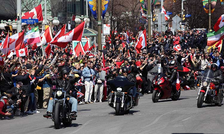 Motorcycles rumble through Canadian capital under police eye