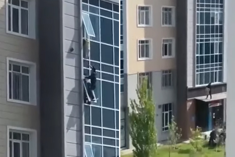 VIDEO: Man clings to building façade to rescue 3-year-old girl hanging from 8th floor in Kazakhstan