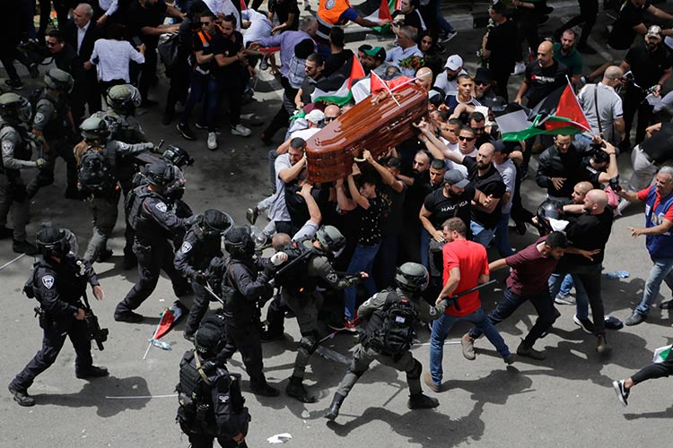 Outcry after Israeli police beat mourners at  journalist Shireen Abu Akleh's funeral