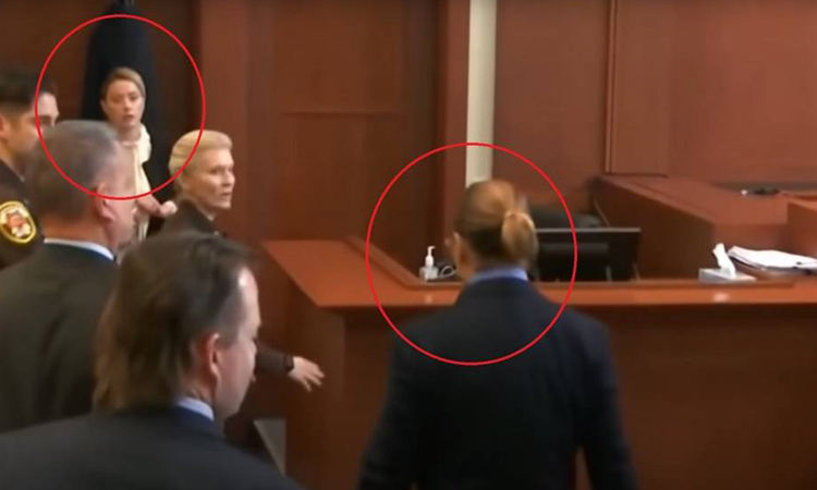 VIDEO: Amber Heard recoils in court after locking eyes with Johnny Depp, video goes viral 