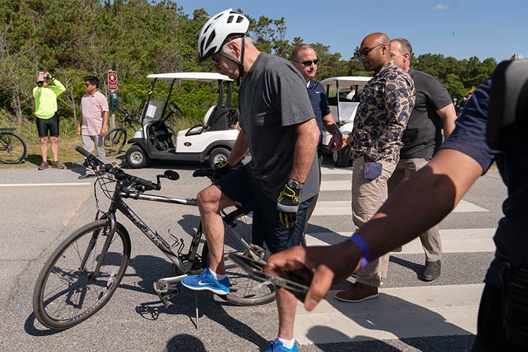 VIDEO: Biden falls from bicycle but is unhurt