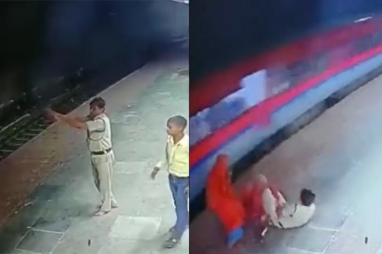 VIDEO: Railway policeman rescues elderly woman from being crushed under the wheels of train 