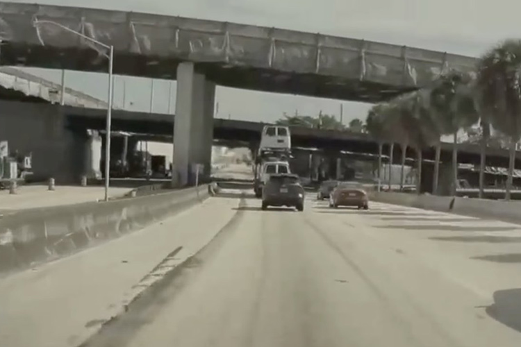 VIDEO: Minivan flies off trailer after crashing into low overpass in Florida