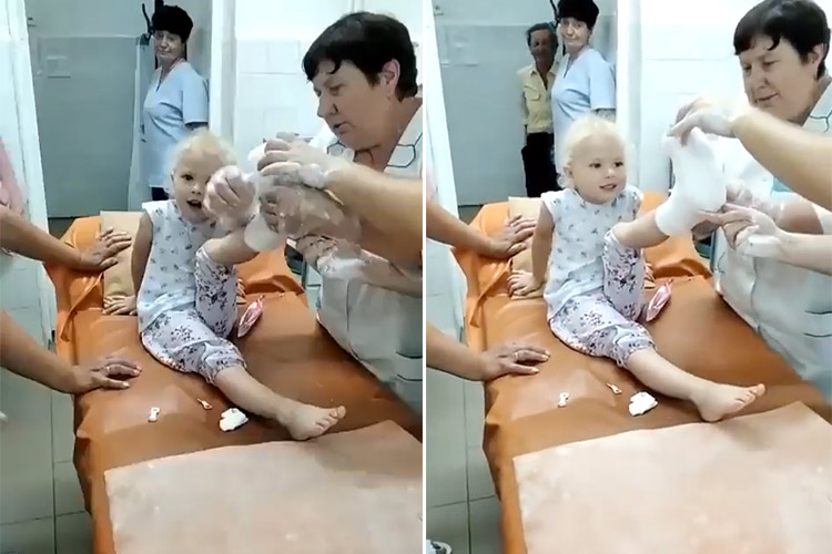 VIDEO: Injured girl sings Ukraine's national anthem while getting bandaged