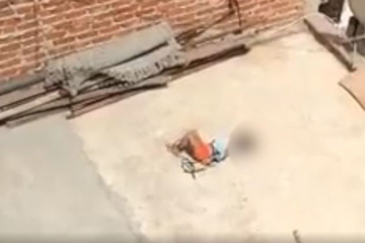 VIDEO: Little girl tied on rooftop in scorching heat for failing to do homework in India