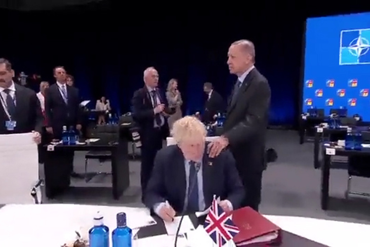 VIDEO: Erdogan taps Boris on shoulder at Nato summit, and the internet loves it