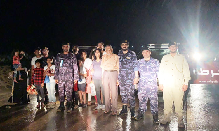 Ras Al Khaimah Police come to help of stranded people amid rain and floods