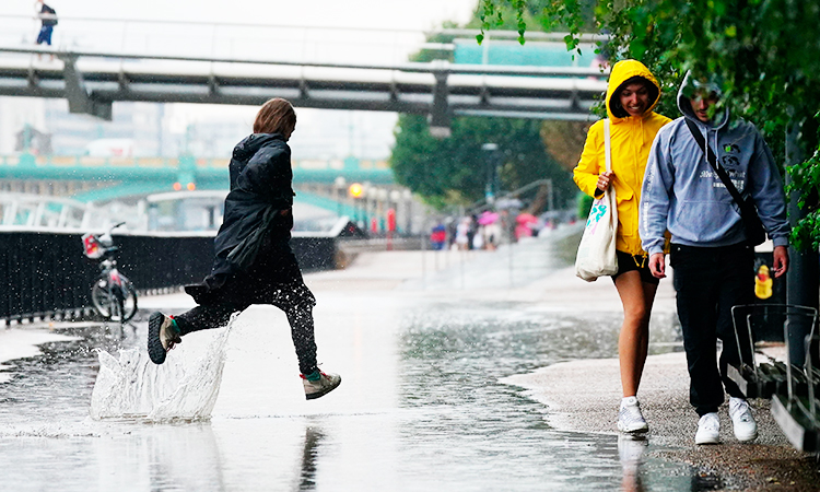 Roads flooded as heavy rain, thunderstorms hit parts of Britain